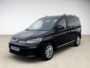 Schwarzer Volkswagen Caddy auf hellem Boden, Seitenansicht, elegante Linien und glänzende Oberfläche.