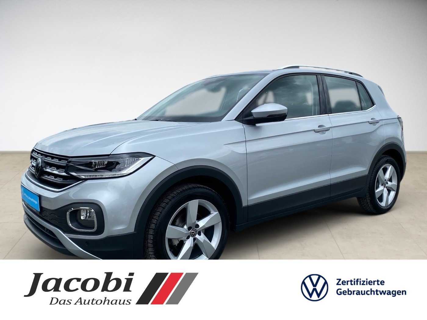 Silberner Volkswagen SUV, Seitansicht, zeigt glatte Linien und dunkle Fensterscheiben.