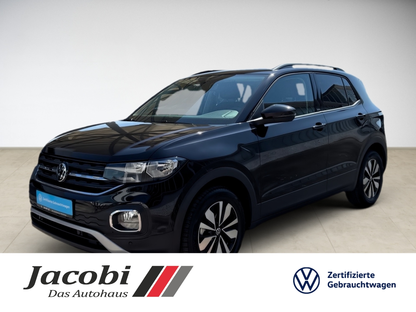 Blauer Volkswagen Crossover mit Dachträger, daneben Jacobi Autohaus- und VW-Logo.