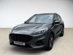 Dunkelgraues SUV mit modernen Leuchten und glänzendem Lack, auf hellem Boden stehend.