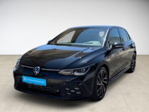 Dunkelblauer VW Golf GTI, seitliche Ansicht, moderner Stil, glänzend, mit markanten Felgen.