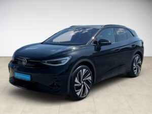 Dunkelblauer Volkswagen ID.4, stilvolles Design, glänzend, moderne Merkmale. Seitenansicht.